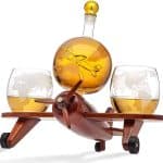 A wooden plane with glassware gift