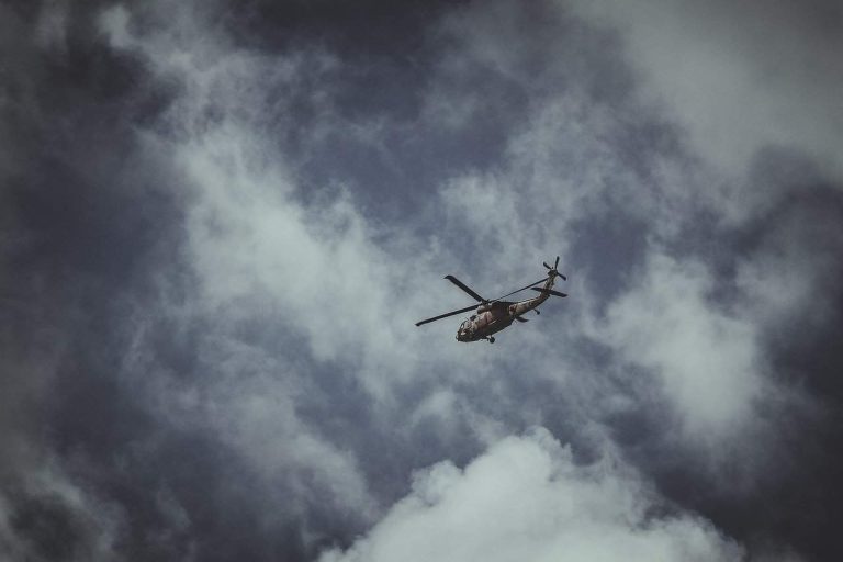 A helicopter flying in stormy weather