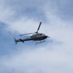 The Cost of Owning a Helicopter (A Breakdown) A mid-priced helicopter flying at a low altitude
