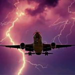 A plane flying during a thunderstorm