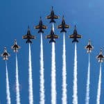 12 Blue Angels planes flying in formation