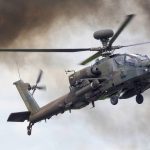 How Much Does An Apache Helicopter Cost? An Apache helicopter flying in the sky