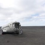 Part of a plane on the ground after a crash