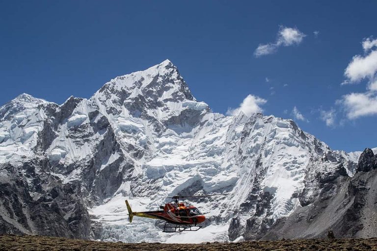 A helicopter flying near Mount Everest