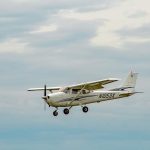 Cessna 152 flying in the sky