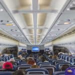 Passengers sitting inside a plane