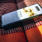 A bottle of shampoo on the couch