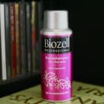 Bringing Dry Shampoo on a Plane: What You Need to Know A bottle of pink and silver dry shampoo