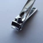 Stainless steel nail clippers on a table