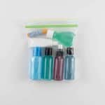 6 containers of liquids in a clear, resealable bag