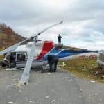 Flying By Plane vs. Helicopters: Which is Safer? A helicopter in the mountains after a crash