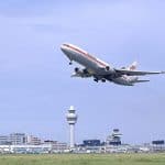 A plane a few moments after taking off at an airport
