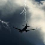 A plane flying in lightning