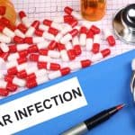 A patient's folder with the words Ear Infection written on it