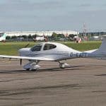 A small plane parked at a flight school