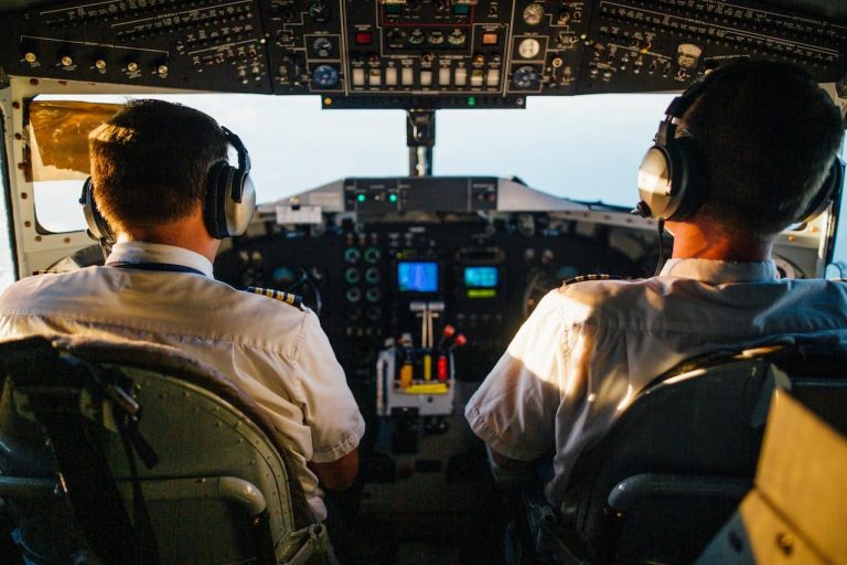 Two pilots sitting in a cockpit