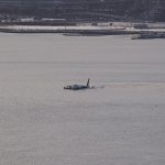 Plane floating in water after crash landing