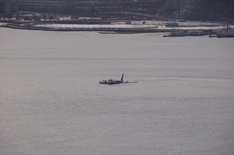 Plane floating in water after crash landing