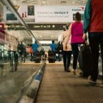 passengers walking through a terminal for their connecting flight
