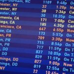 Will Airlines Provide or Pay for Accommodation if Your Flight is Canceled? Flight board at an airport showing cancelled flights
