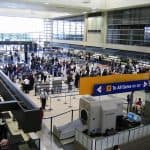 passengers transiting through a busy airport