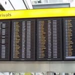 Flight board showing a list of delayed and cancelled flights